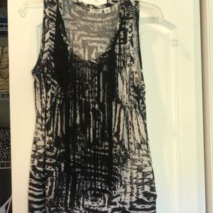 Very cute tank top with fringe